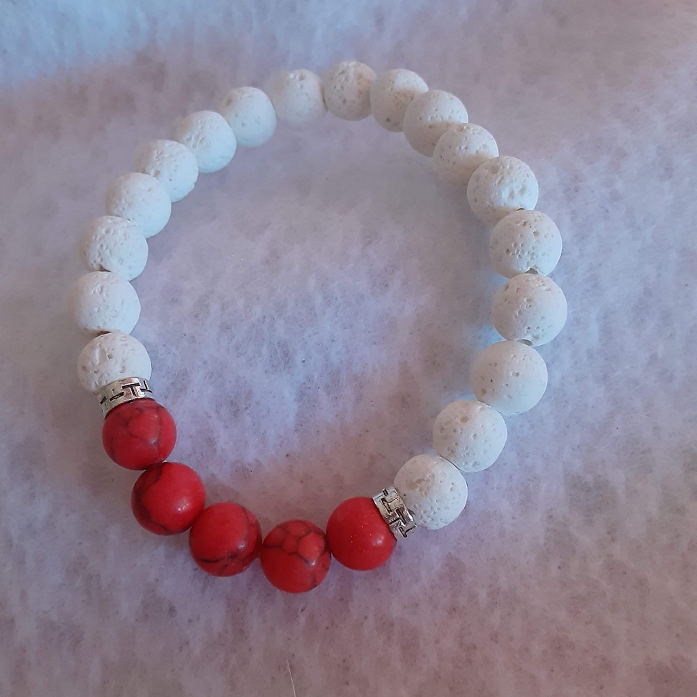 White lava stone beads with red beads bracelet.
